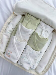 First Baby Wardrobe 30-in-1 "Green dinosaurs"